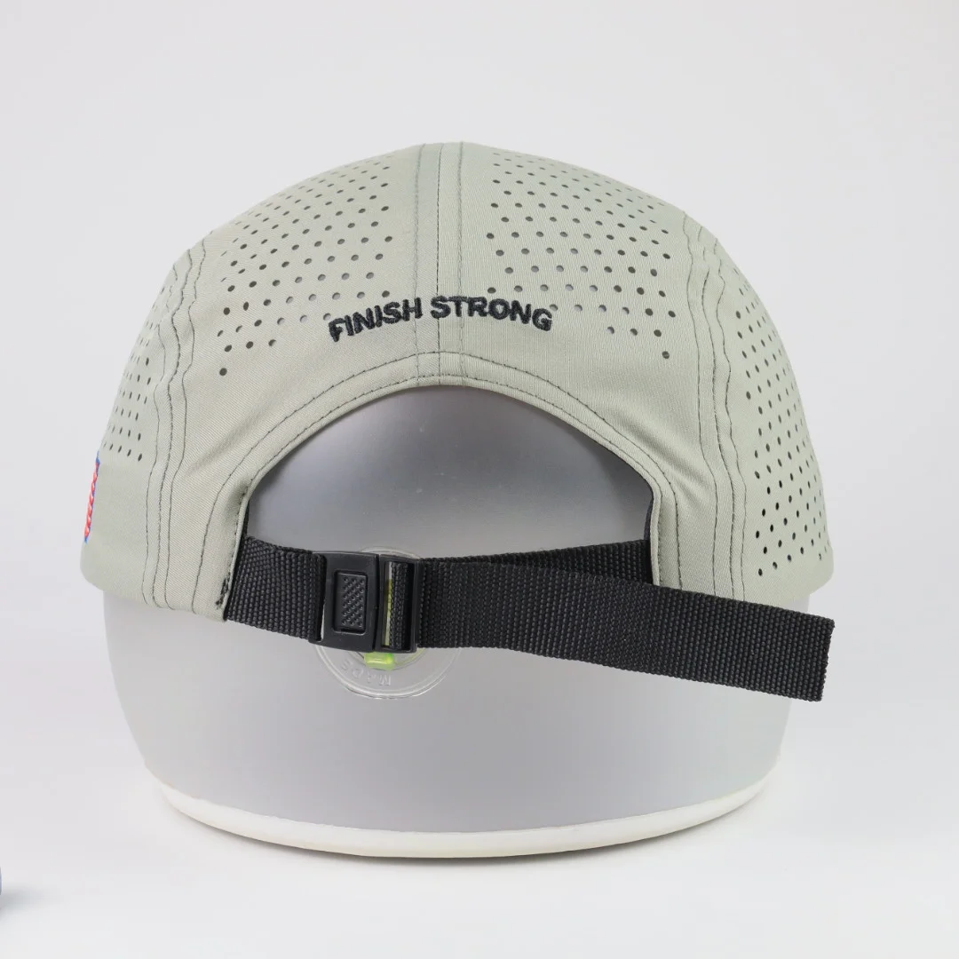 Rear of sage perforated cap showing black adjustable strap and rear embroidery